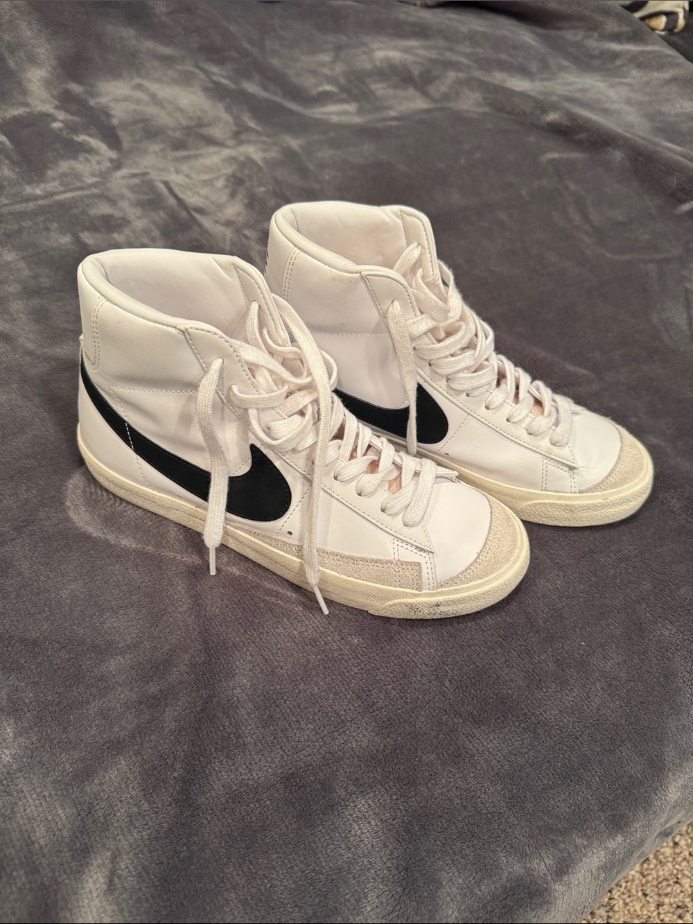 Nike Women's White High-Top Sneakers with Black Swoosh